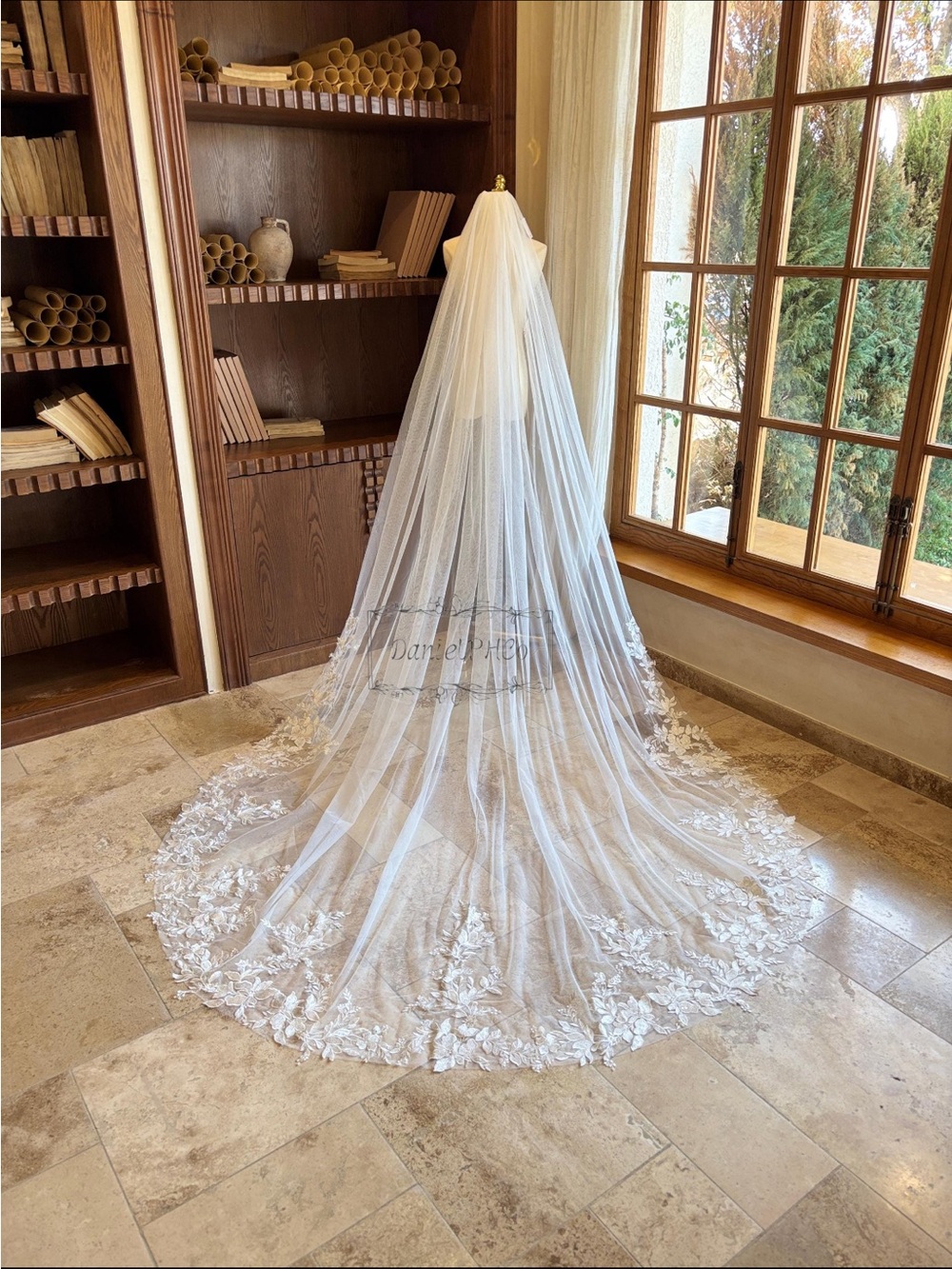Ivory chapel length wedding veil with lace